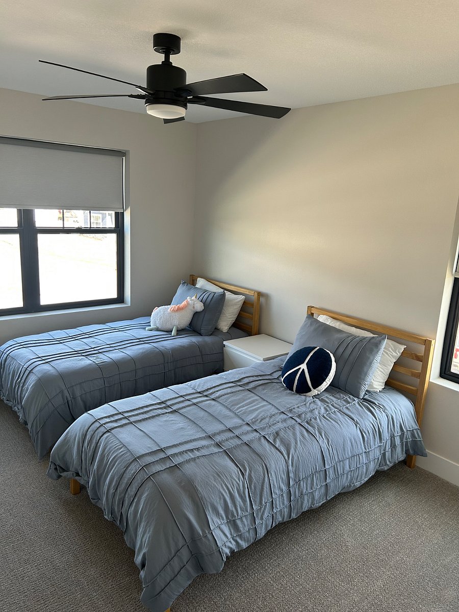 2nd Bedroom with dresser, desk and 2 twin beds