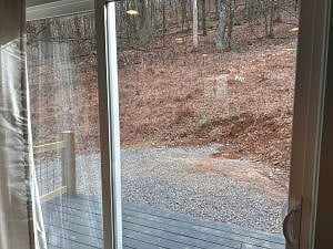 Sliding back door entrance with parking in back. Best place to park to avoid the stairs.