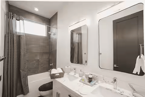High ceiling bathrooms gives them an ultra luxurious feel. This bathroom is on level 2. All bathrooms stocked with soaps, shampoos, conditioners, body lotions and make-up removers (one time only). Soft white towels and washcloths also provided