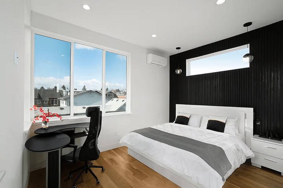 Master bedroom with King bed on level 3. Hotel style bedding and extra blanket provided with every bed. Extra pillows in the bedroom closet. Office Desk and Chair in the Master Bedroom