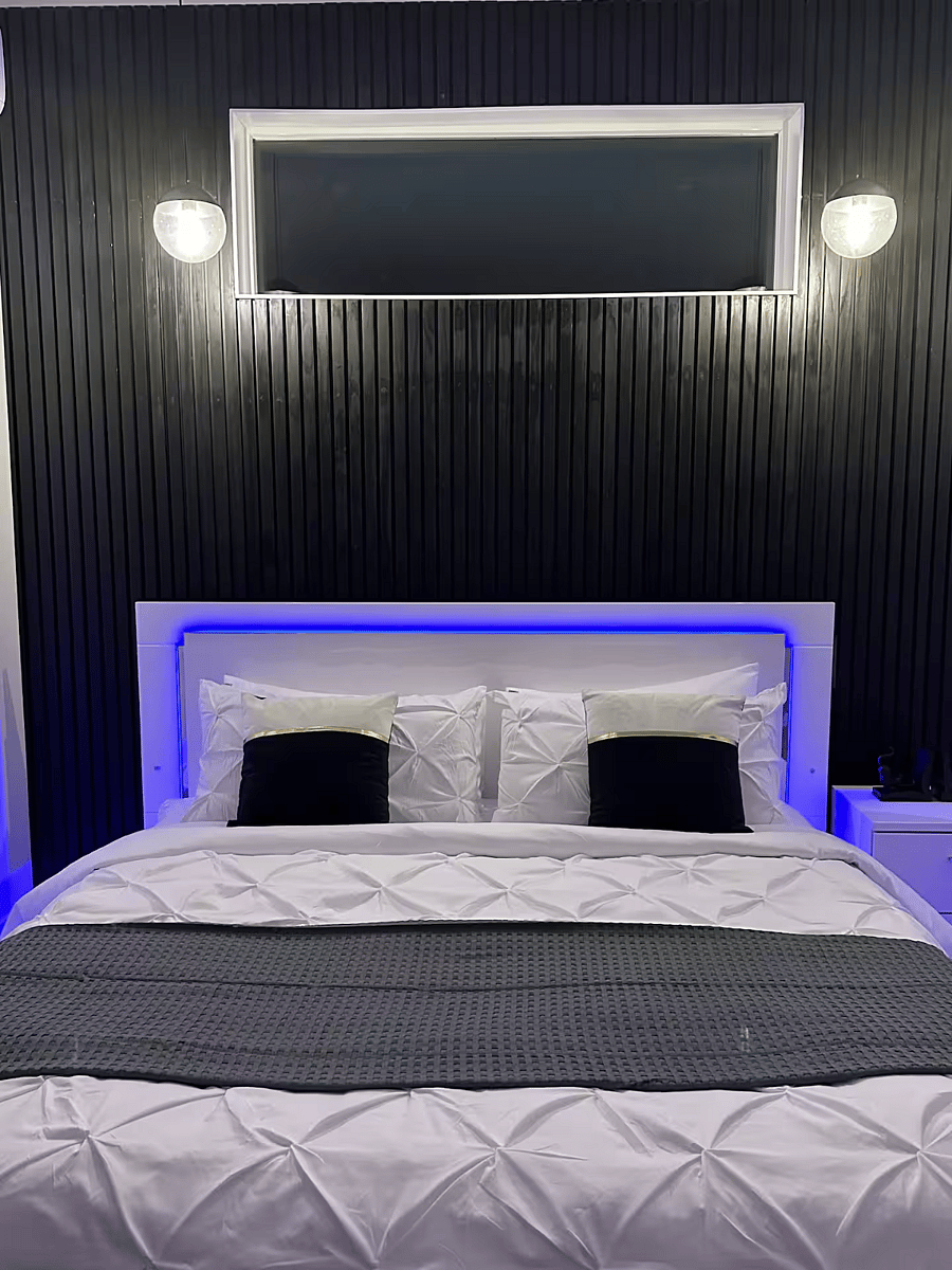 Master Bed has LED lights that can be turned on as a night light. Skylight window above the master bed