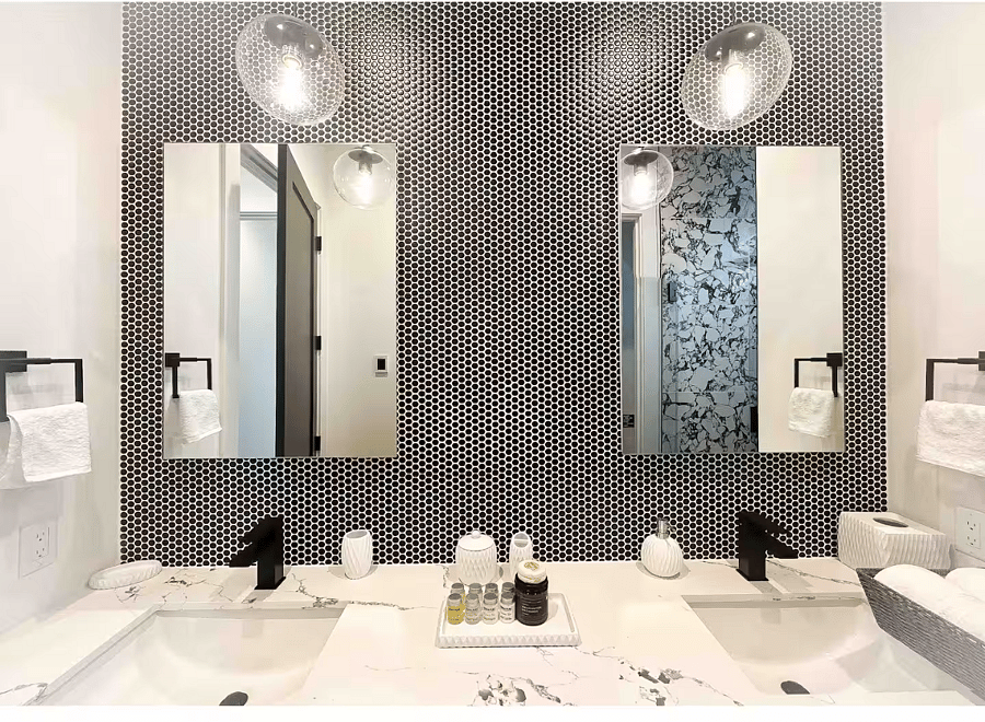 2 faucets and 2 mirrors in the master bath