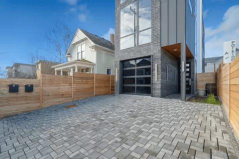 Dedicated 1-space parking lot on the right side of the driveway