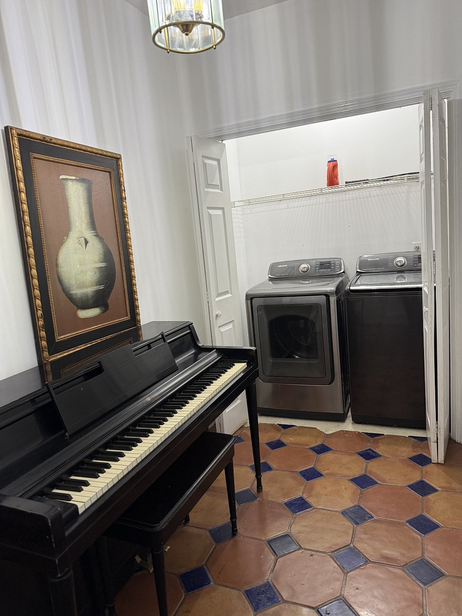 Interior Amenities - Laundry Area/ Piano