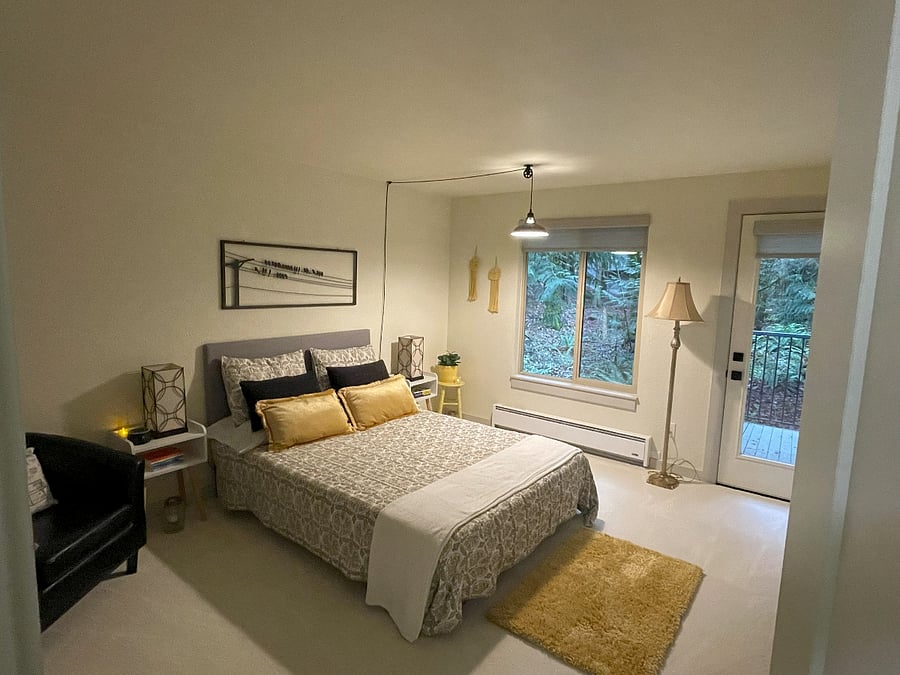 Room with forested area exterior