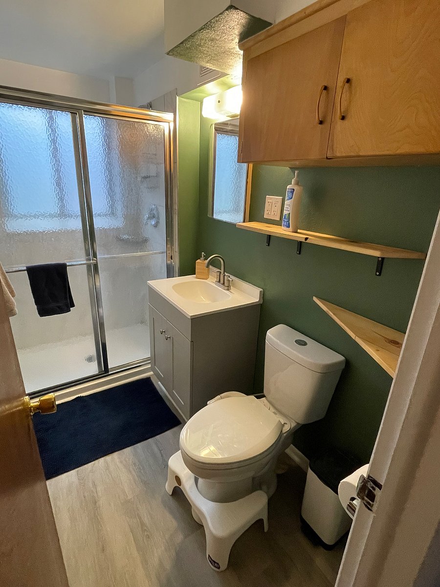 Semi-private bathroom downstairs (across hall from available bedroom)