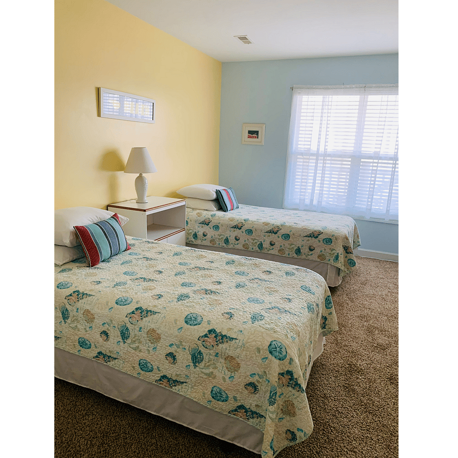 Bedroom 3 - Two twin size beds (can be put together to make a King). This room has a work space with a desk/chair/lamp with 3 lights, and sockets for your computer. This room is the only room without a beach view. It shares a bathroom with Bedroom 2 (a "Jack & Jill" with separate bathroom doors).