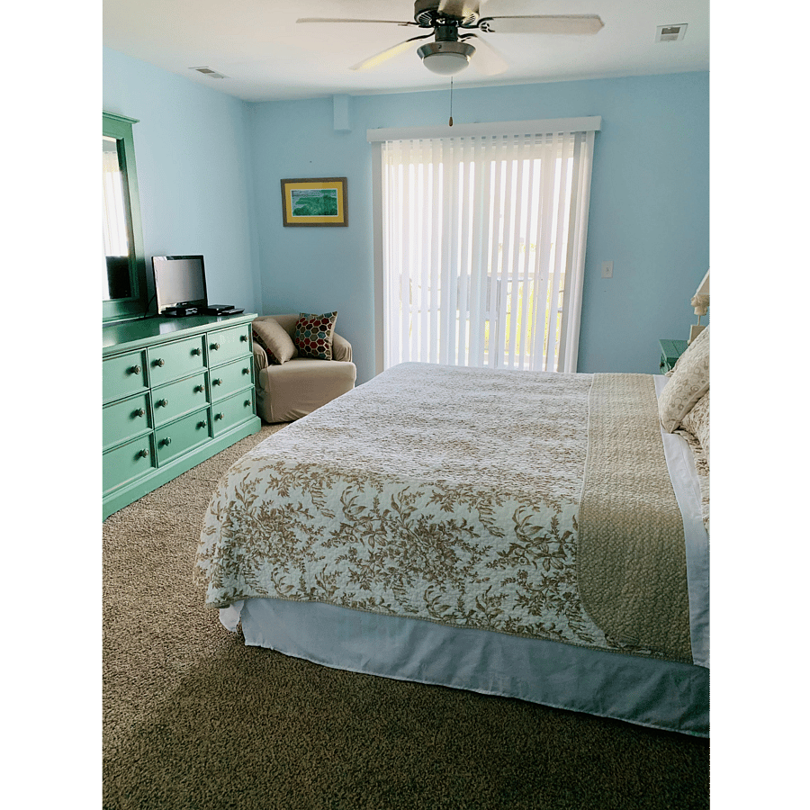Bedroom 2 - King Bed - Sliding doors to deck. Small TV w/cable. Shared "Jack & Jill" bathroom w/shower, is between bedroom 2 and 3 (w/separate entrance doors).