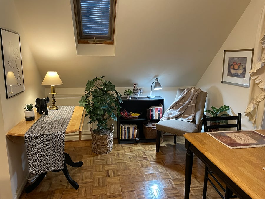 Sitting area overview.  Round table on left with drop leaves can provide extra work space for your kitchen activities if needed.