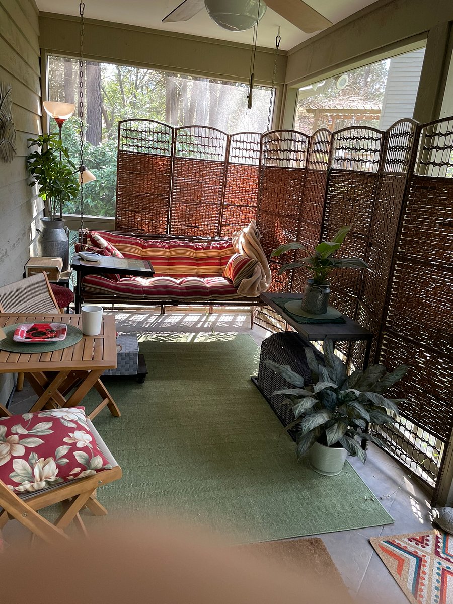 Bring your morning coffee or your evening wine glass down the stairs to hang out here.  Enjoy both privacy and fresh air, with a ceiling fan for the warmer days, while you rock in the porch swing, listen to the birds, maybe bring lunch to eat on the bistro table.  Even has night lighting for my fellow night owls. 