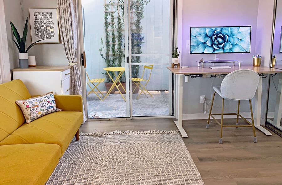 office with couch that folds down into a twin bed