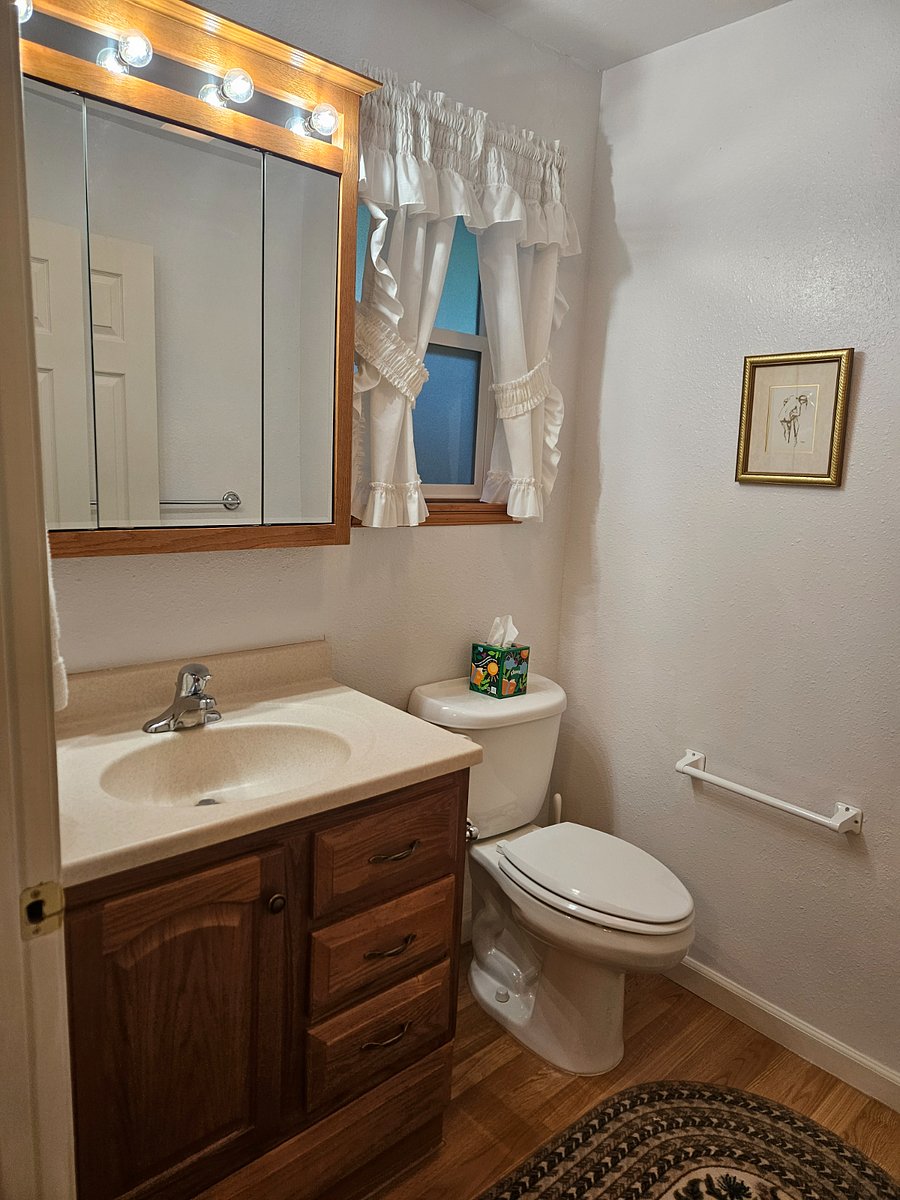 1/2 bath off of second bedroom