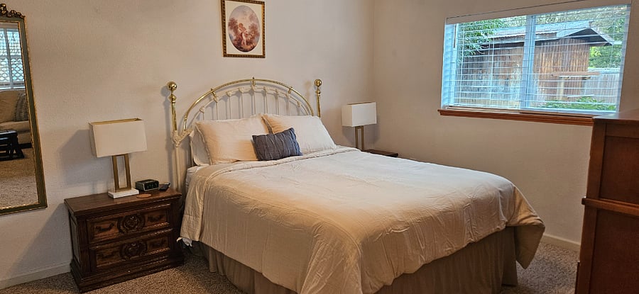 Master bedroom with queen bed