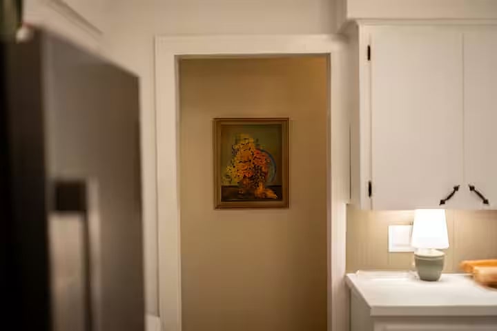 View into the hall from the kitchen.