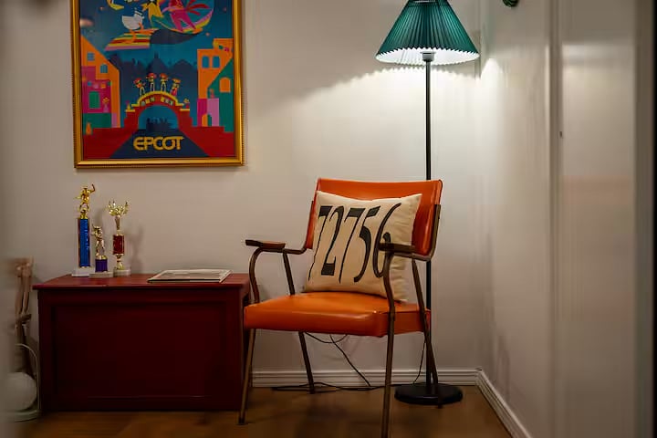 Colorful fun room! Authentic mid-century chair and custom 72756 Rogers zip code pillow.