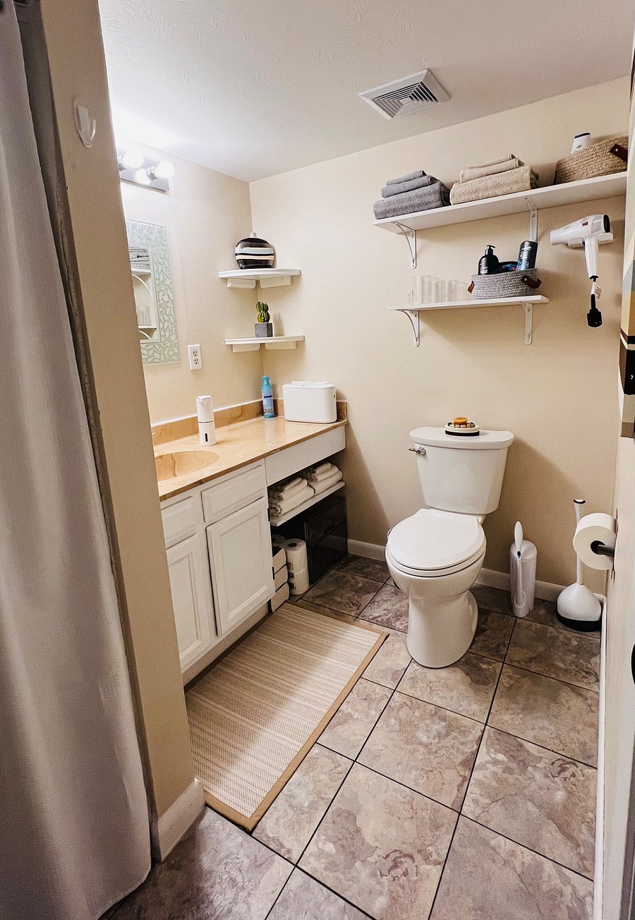 Bathroom is for guest exclusive use, located up a short flight of stairs. 