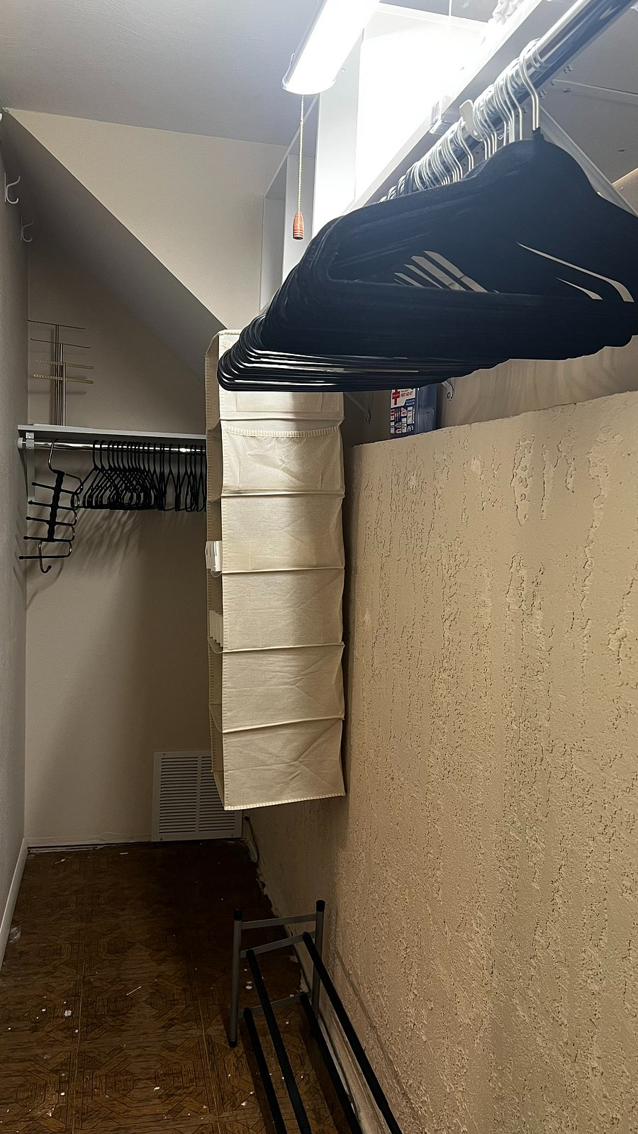 Spacious walk-in closet with plenty of storage for longer stays.