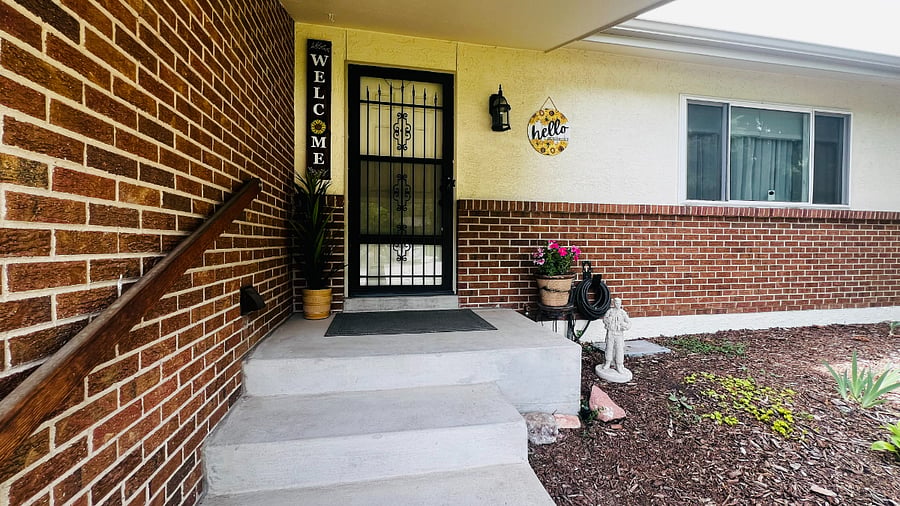 Shared front entry; private basement suite located downstairs.