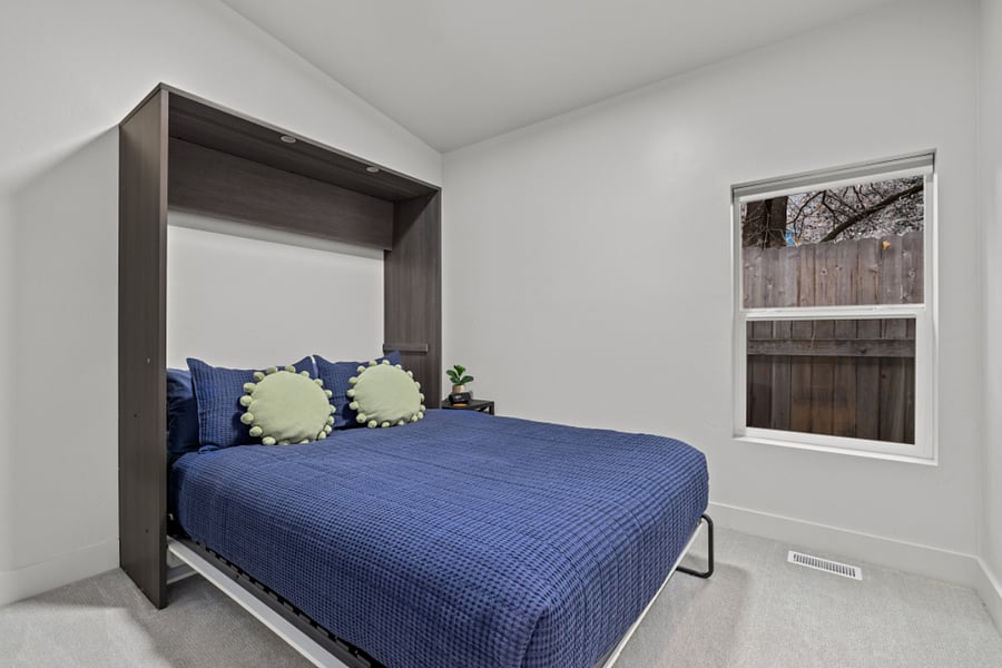 Guest bedroom one with queen bed