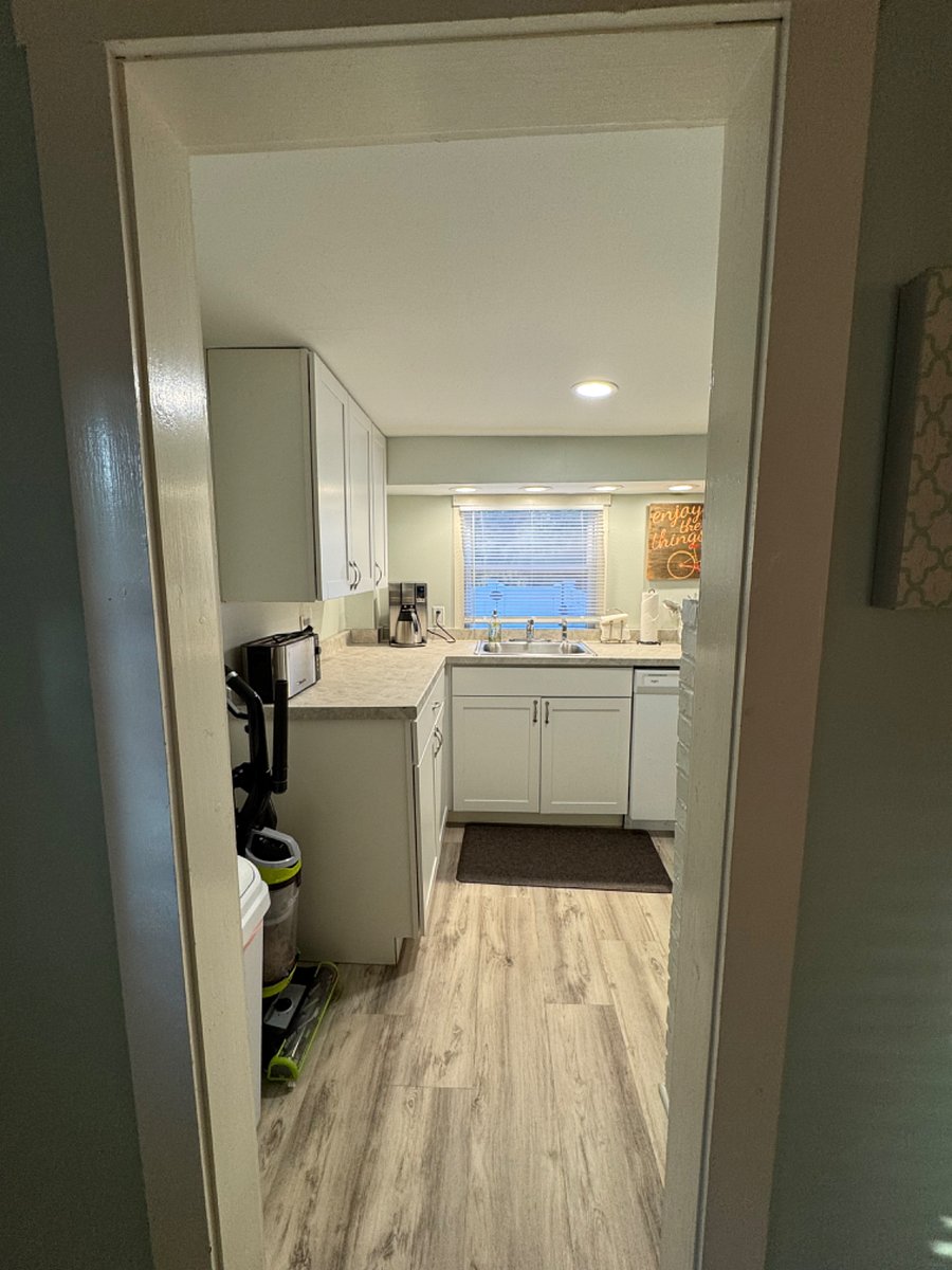 Galley kitchen. On your left when you enter house