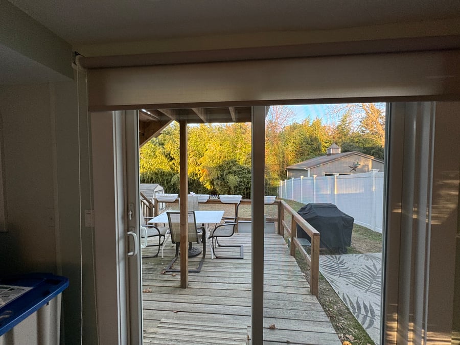 Sliding glass door off back of house to enter yard