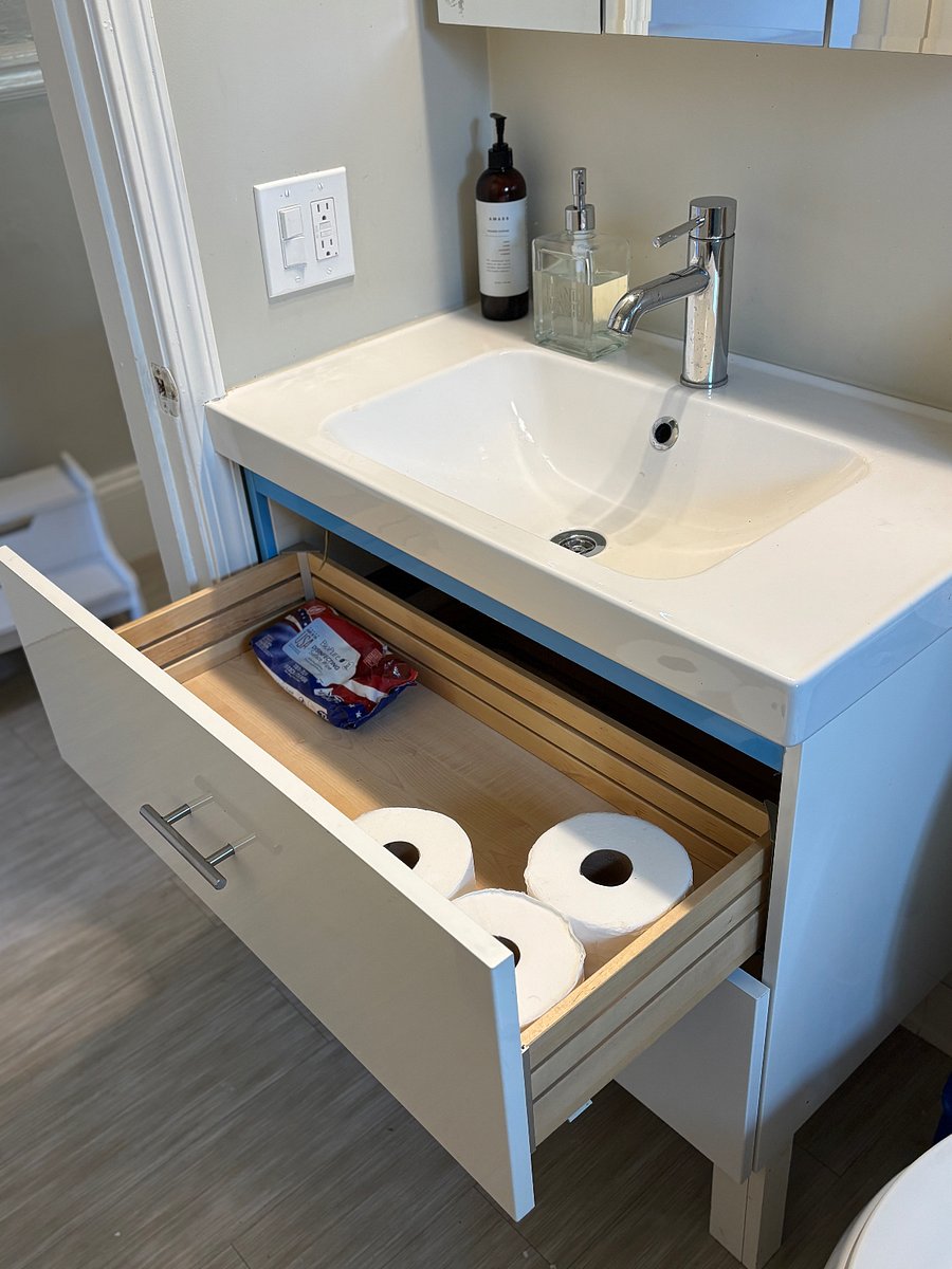 Bathroom drawer and sink.
