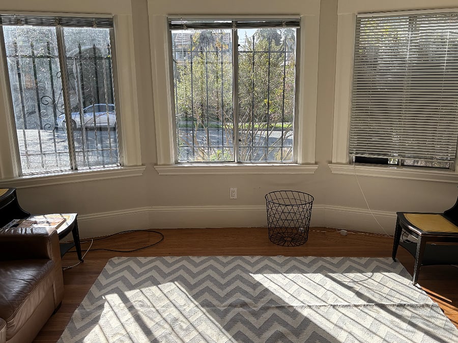 Living room sunshine spills in. 