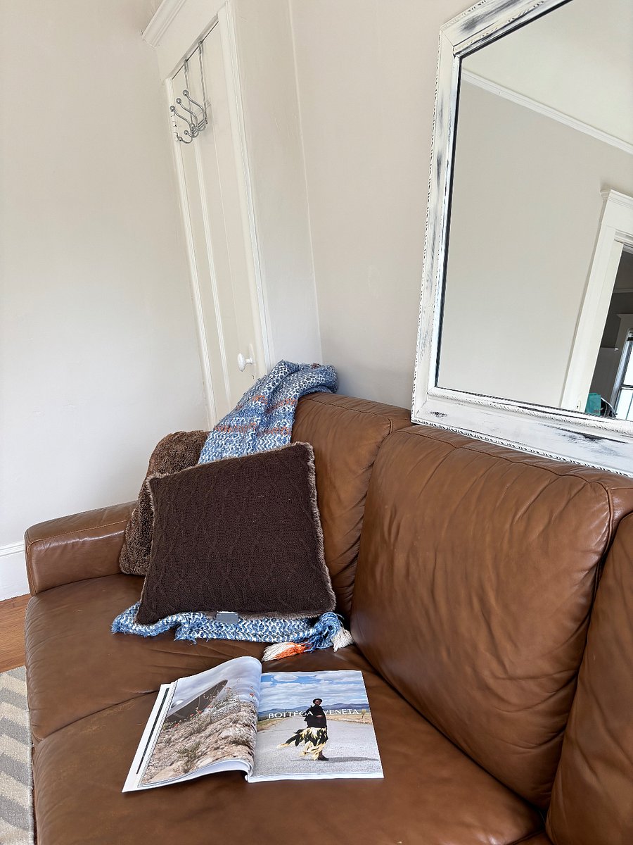 living room couch and throw, international Vogue/other magazine