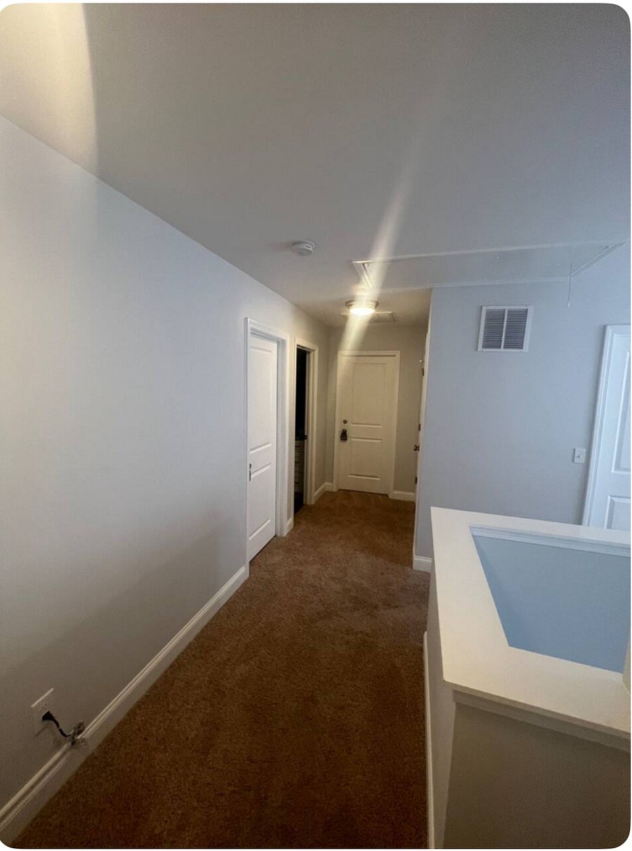 Hallway upstairs where bedrooms located