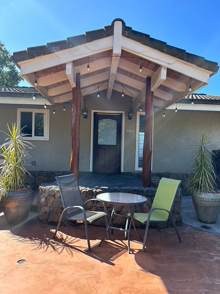 private patio with table, chairs, and bar-b-que