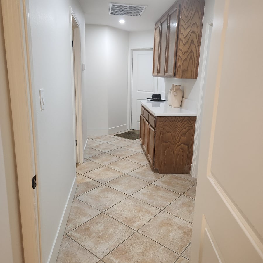 Hallway to private bathroom