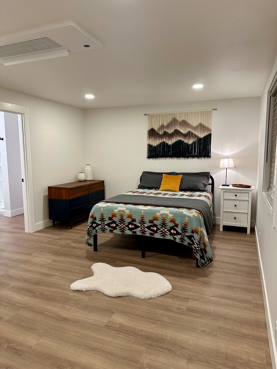 Second bedroom with side exterior door and minibar with fridge.