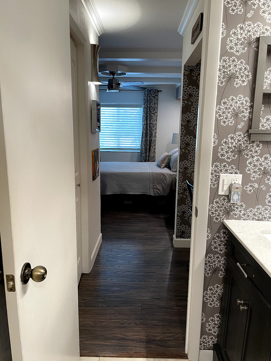 View from bathroom looking into bedroom