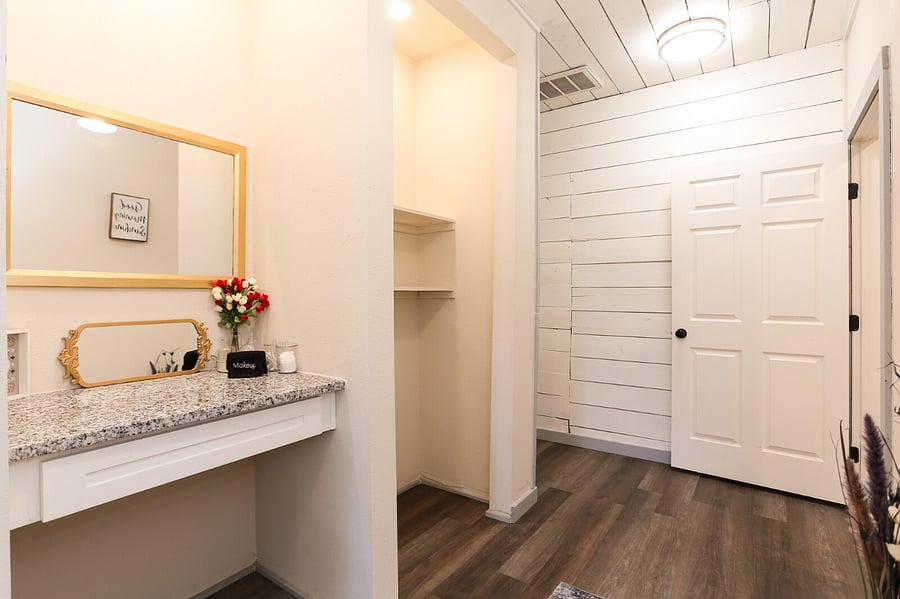 Hallway/dressing area in primary suite.