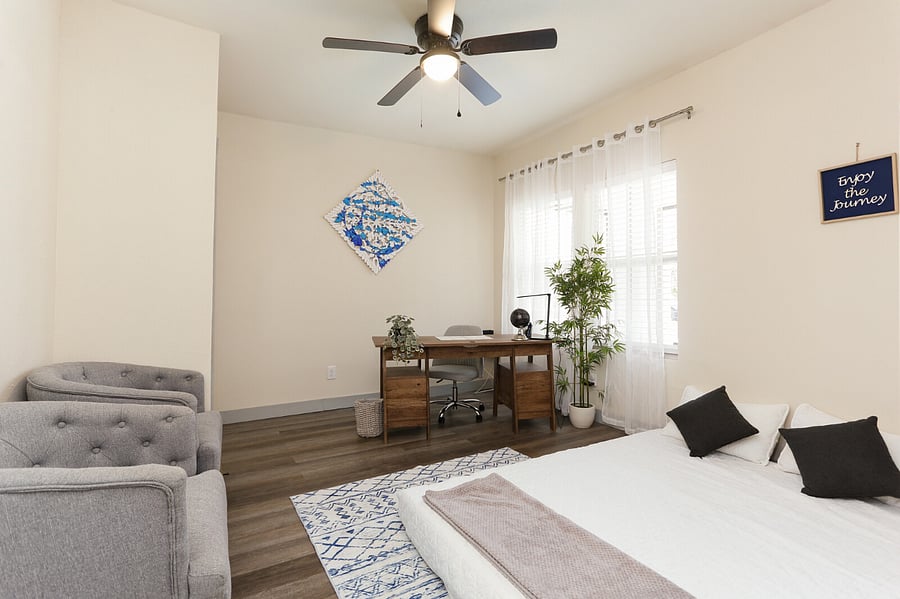 The office can be easily used as a third bedroom with the daybed.