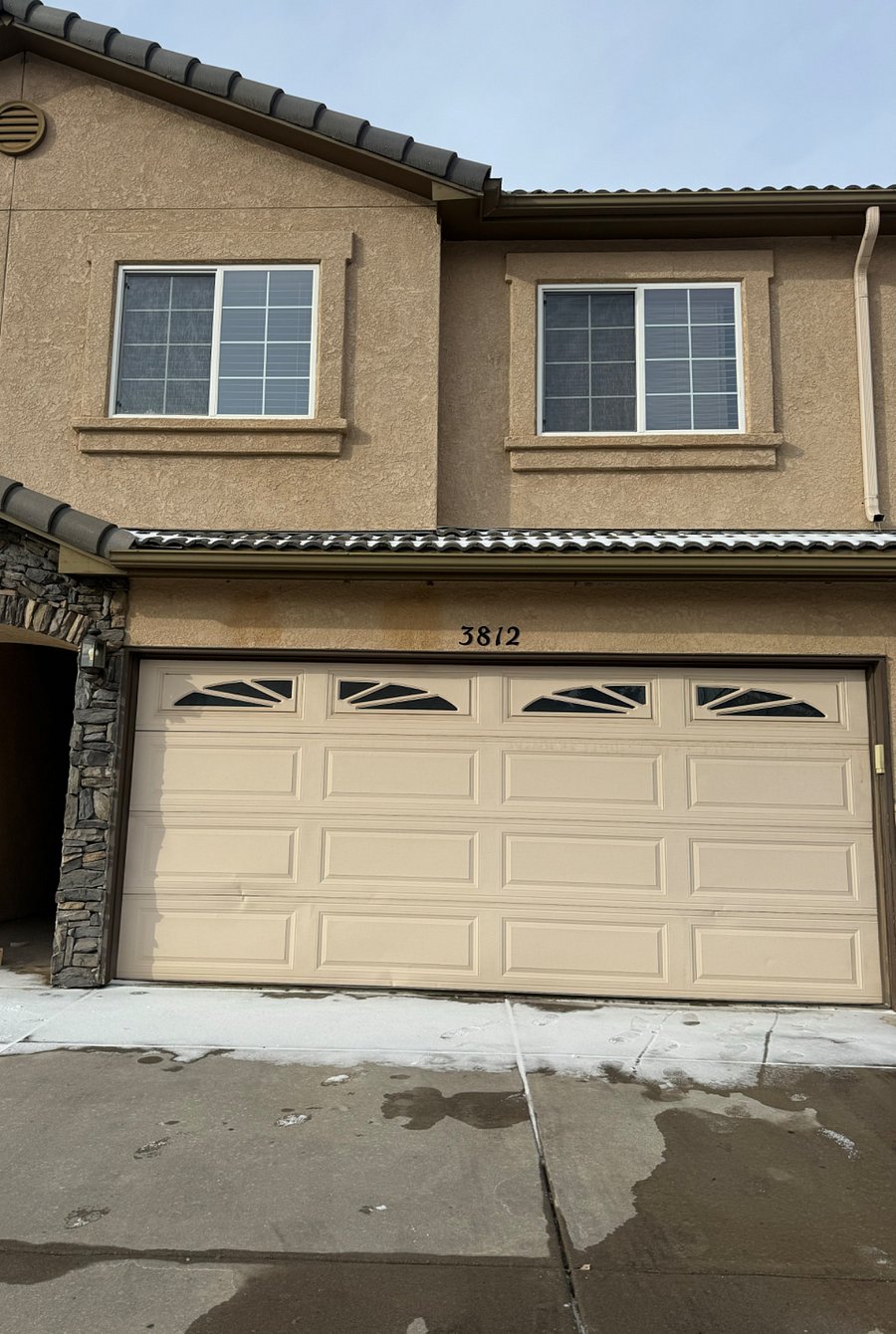 Exterior of the townhouse and 2 car garage. The HOA shovels the driveways when it snows, which is plus in the winter!