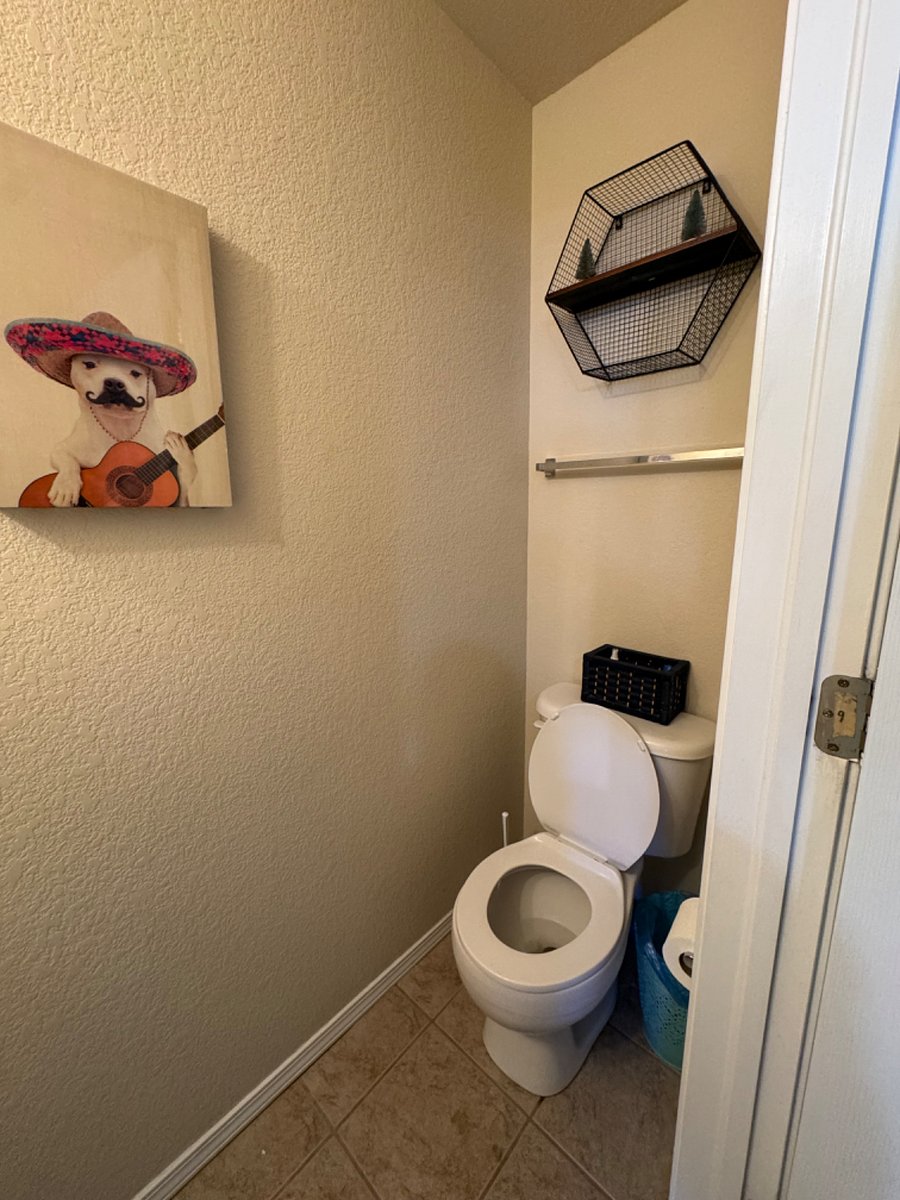 1/2 bath located downstairs