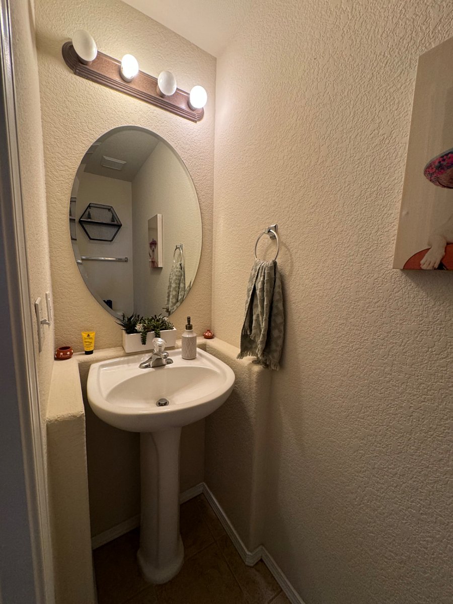 1/2 bath located downstairs