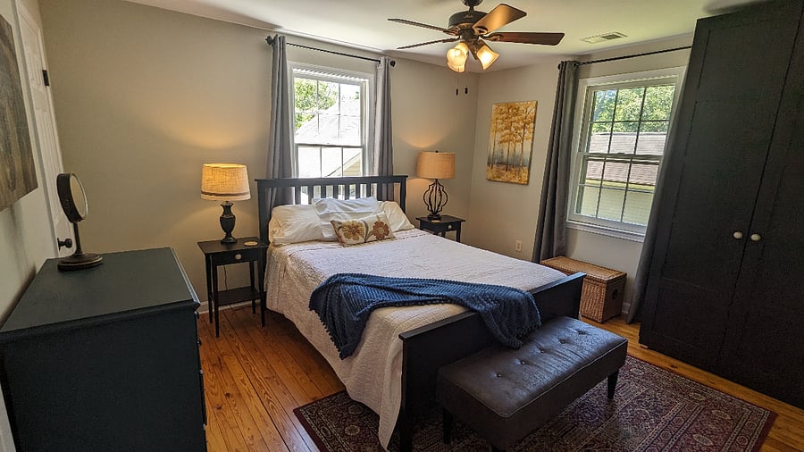 Master bedroom with 2 closets and dresser