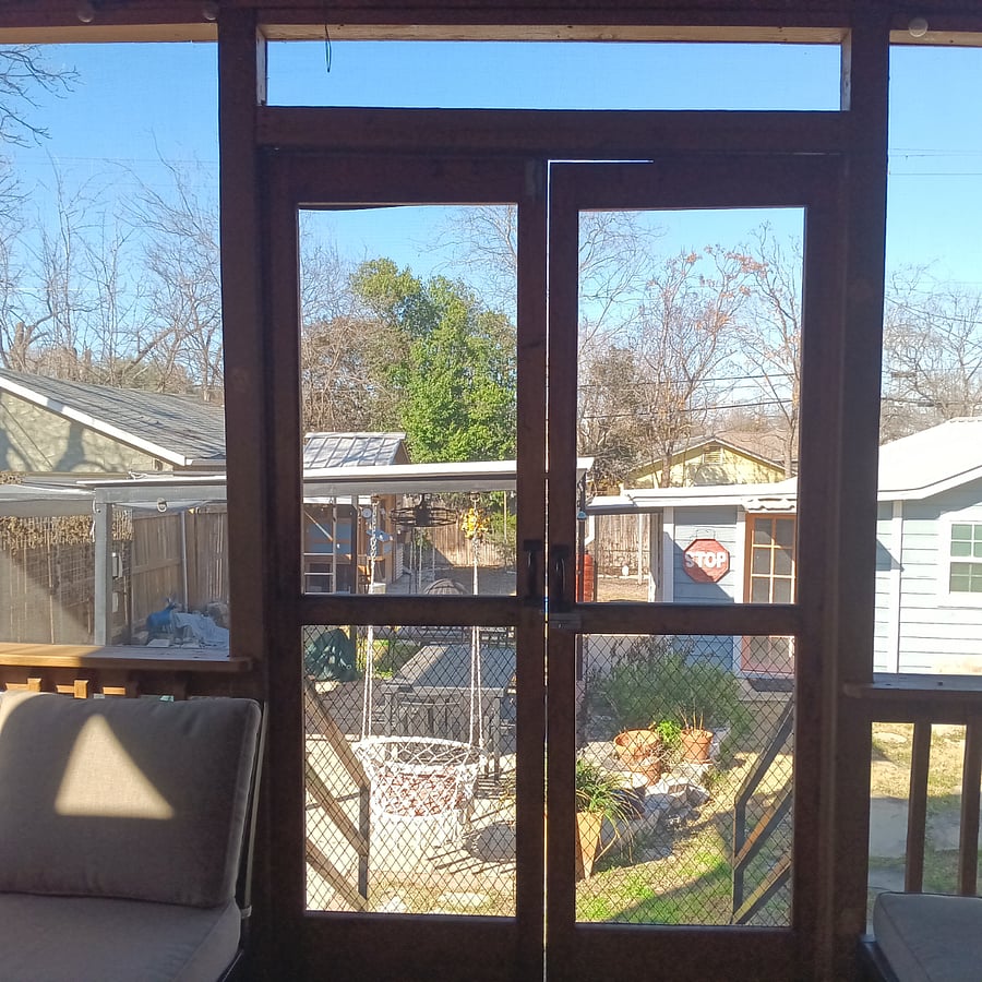 Outdoor view. Can see rhe chicken coop and outdoor covered patio