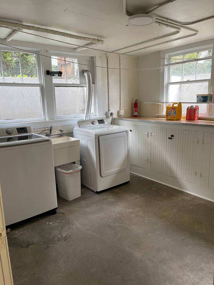 laundry room with extra storage