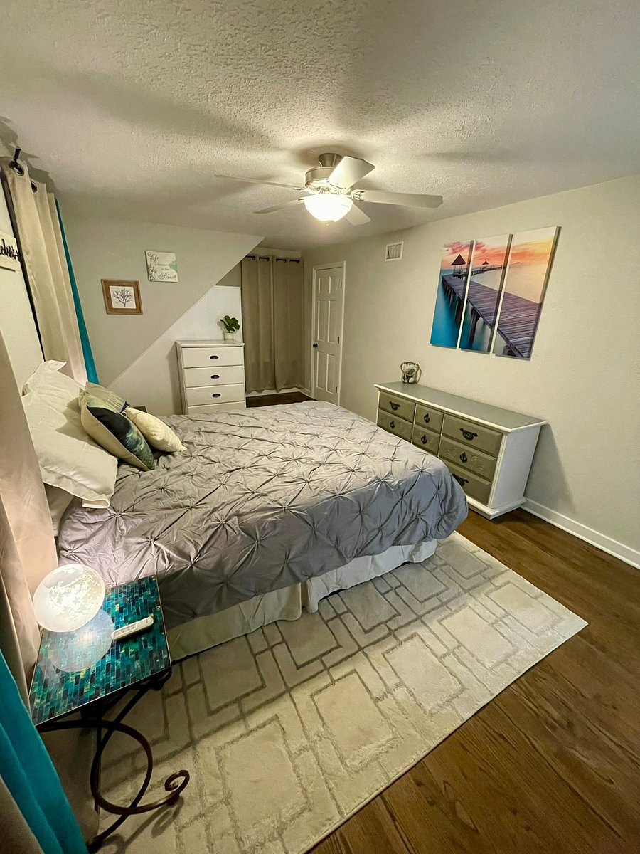 This bedroom now has a desk and desk chair.