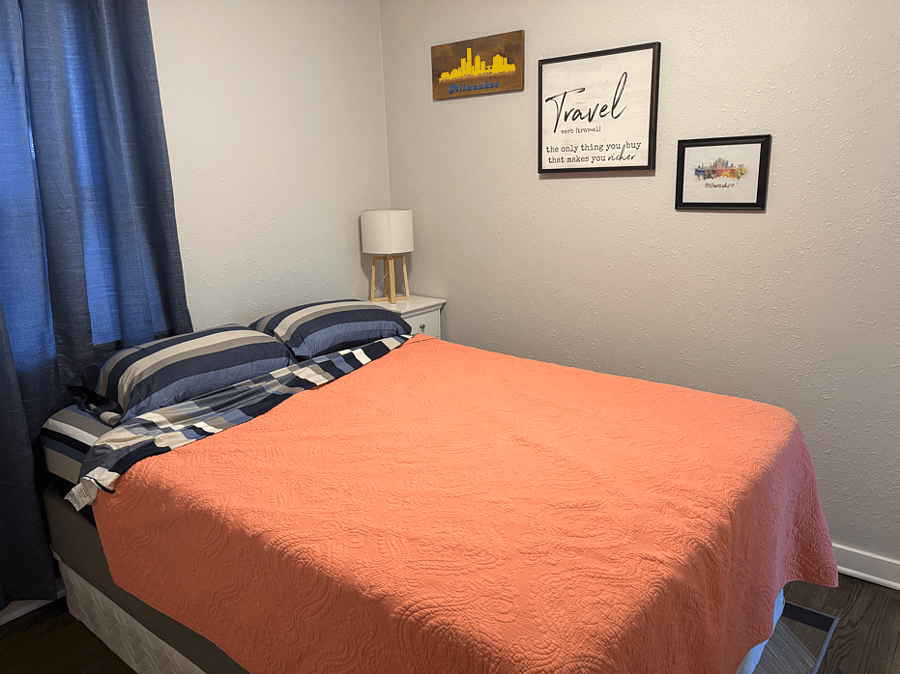 Second bedroom, with queen size bed, nightstand, dresser and closet