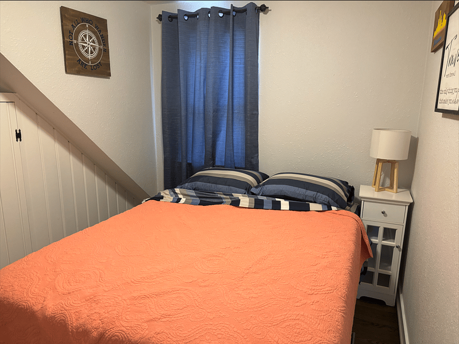 Second bedroom, with queen size bed, nightstand, dresser and closet
