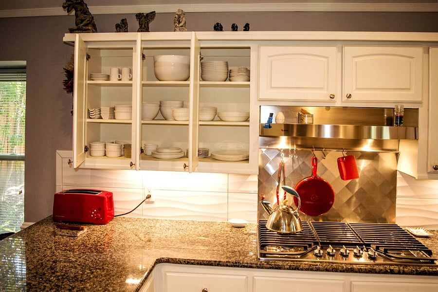 Kitchen is stocked with appliances, dishes for 8, cookware, gas cooktop & spices