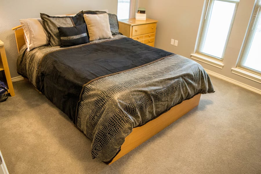 The smaller Bedroom with Queen-sized bed and Scandinavian style furniture.