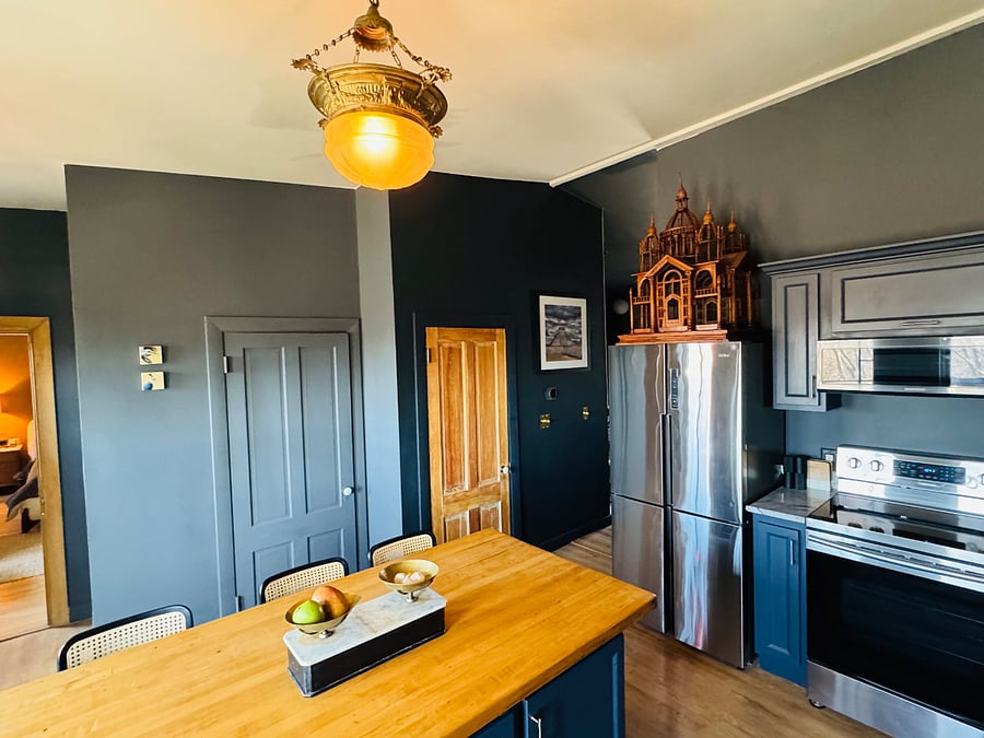 Laundry room on left and half bath on right door