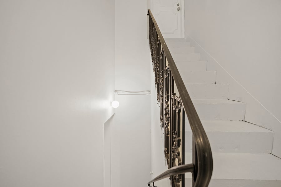 stairs from bottom hallway to upper unit door. There is NO elevator