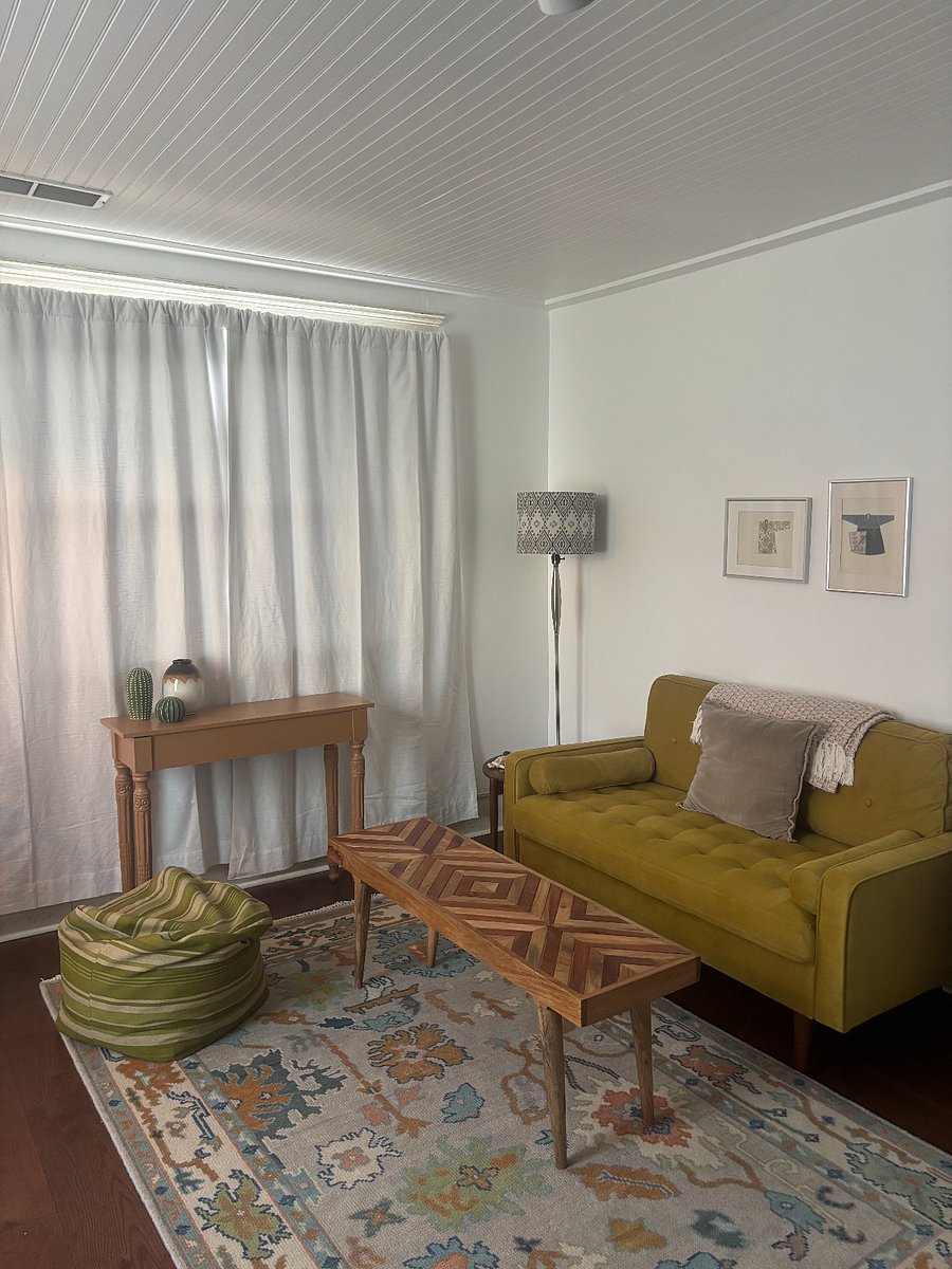 Sitting area with blackout curtains. 
