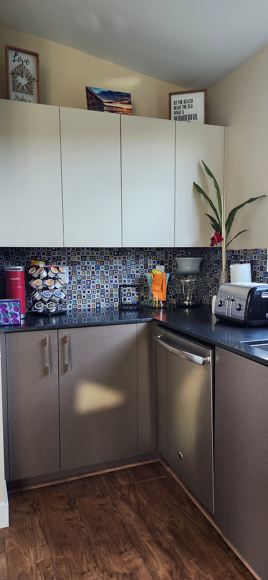 Breakfast nook with Kuerig, 4-slice toaster, and plenty of counter space directly over the full-sized dishwasher.